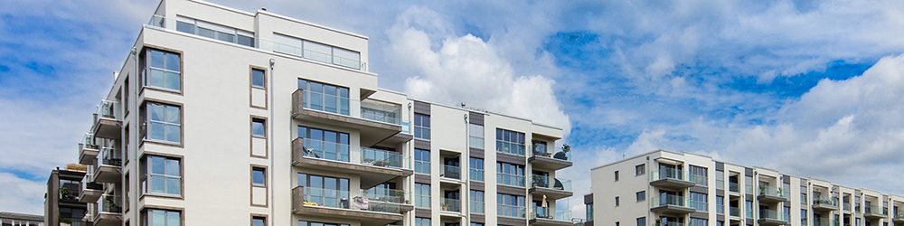 modern apartment building exterior - real estate