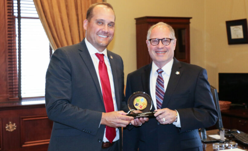 Senator Langerholc receiving Champion of Public Education award