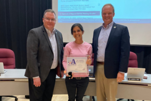 PSBA CEO Nathan Mains with 2022 Allwein Society inductee Karen Beck Pooley and Mike Faccinetto