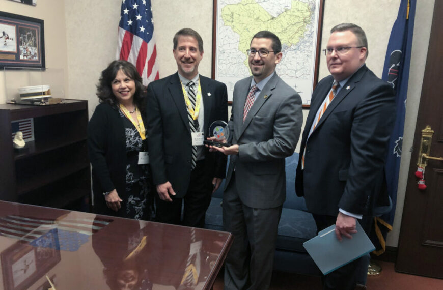 Member Outreach Manager Lena Hannah PSBA President David Hein and PSBA CEO Nathan Mains present Rep. Ortitay with PSBA Champion of Eudcation award