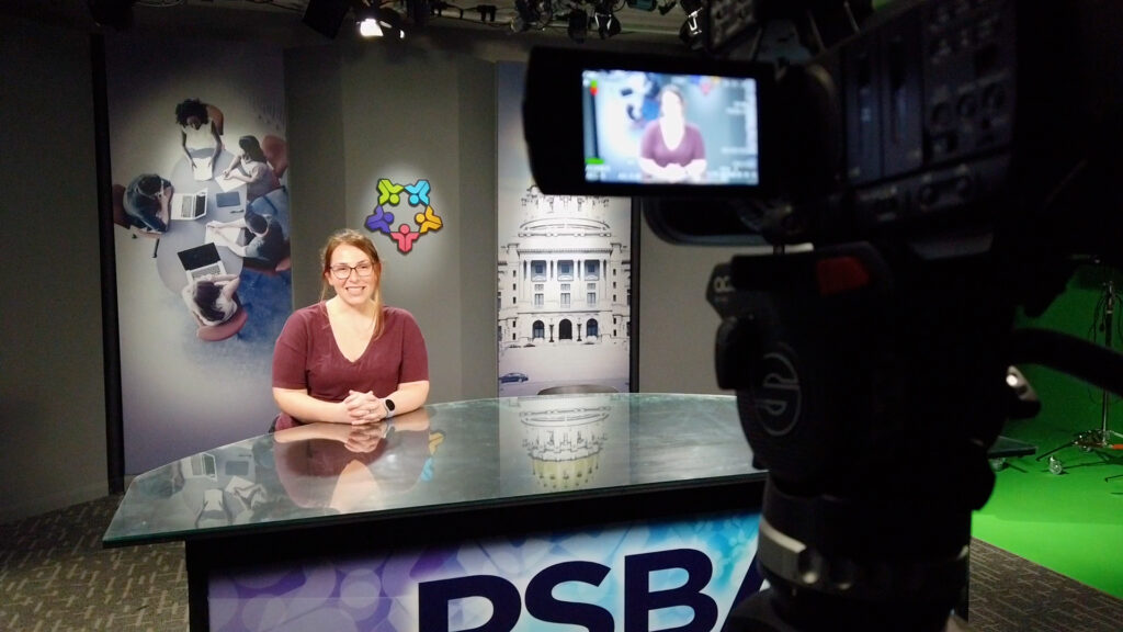 Outreach staff recording the Countdown at studio desk