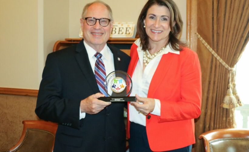 Rep. Brown presented award by PSBA Immediate Past President Art Levinowitz