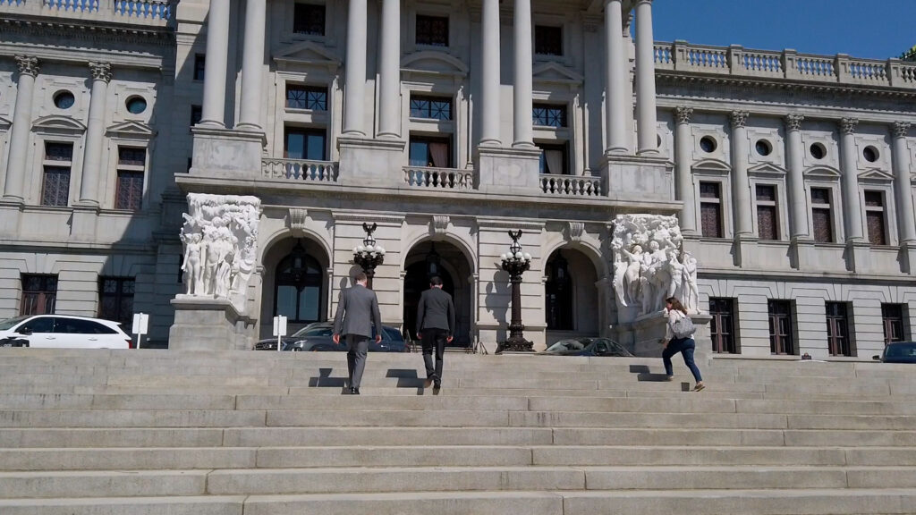 Wide shot of GA staff walking up to Capitol